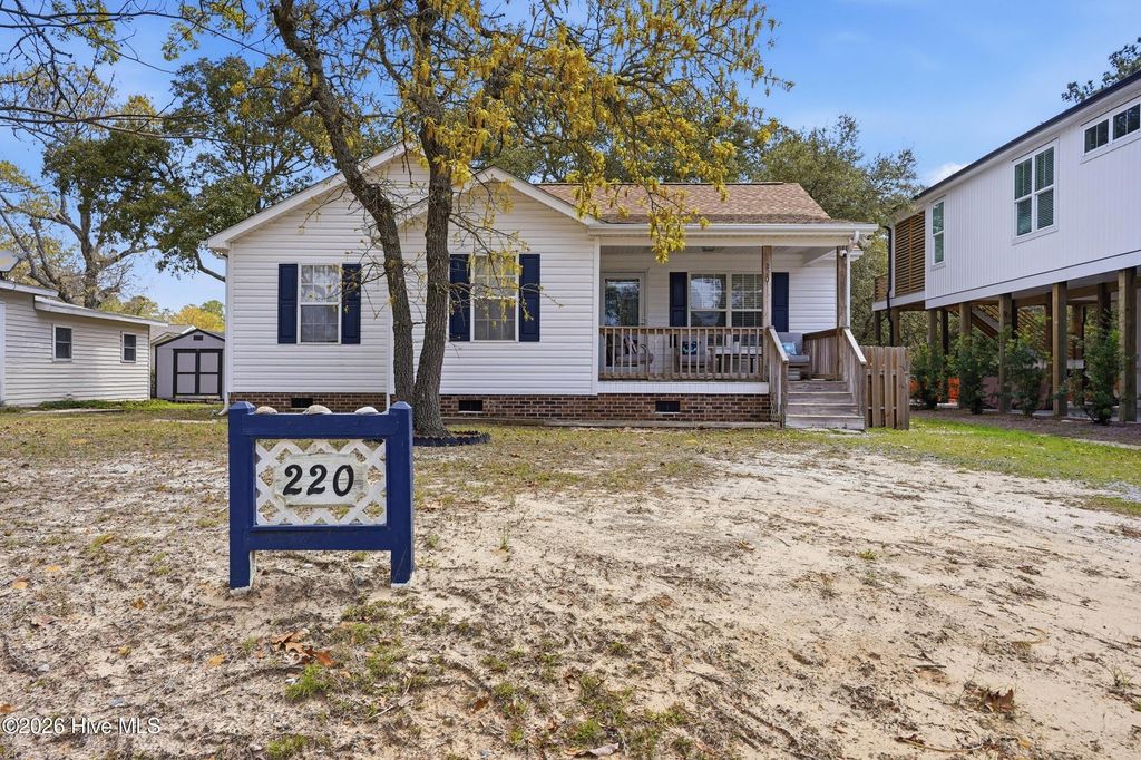Photo of 220 NE 55th Street, Oak Island, NC 28465 (MLS # 100565578)