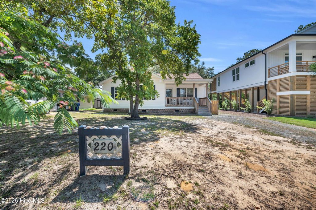 Photo of 220 NE 55th Street, Oak Island, NC 28465 (MLS # 100565578)