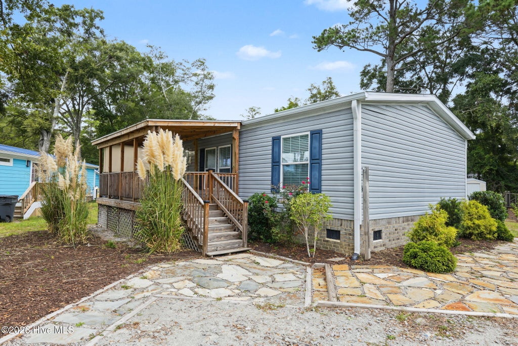 Photo of 8990 Bonaparte Drive SW, Sunset Beach, NC 28468 (MLS # 100608140)