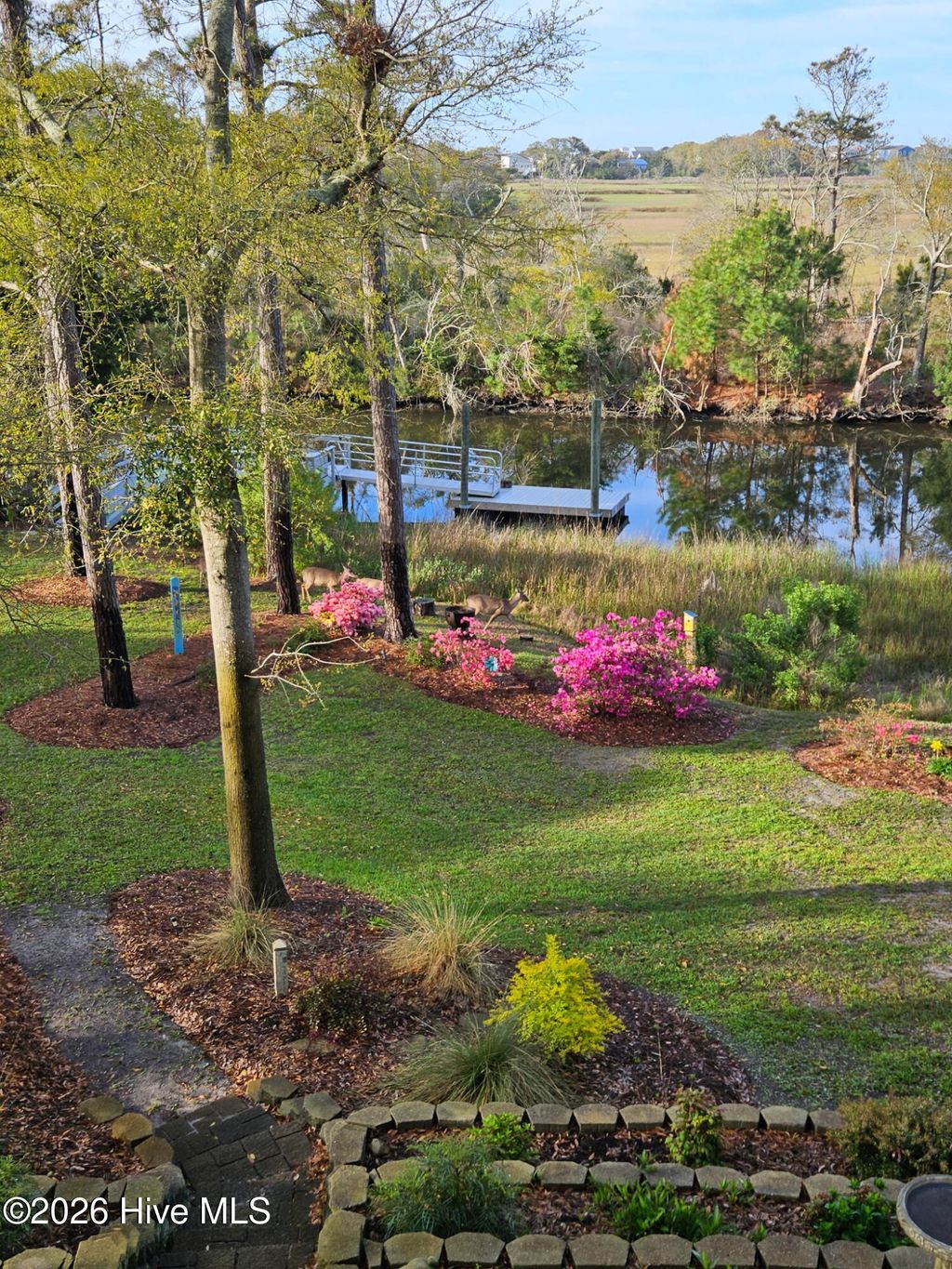 Photo of 103 SE 27th Street, Oak Island, NC 28465 (MLS # 100558416)