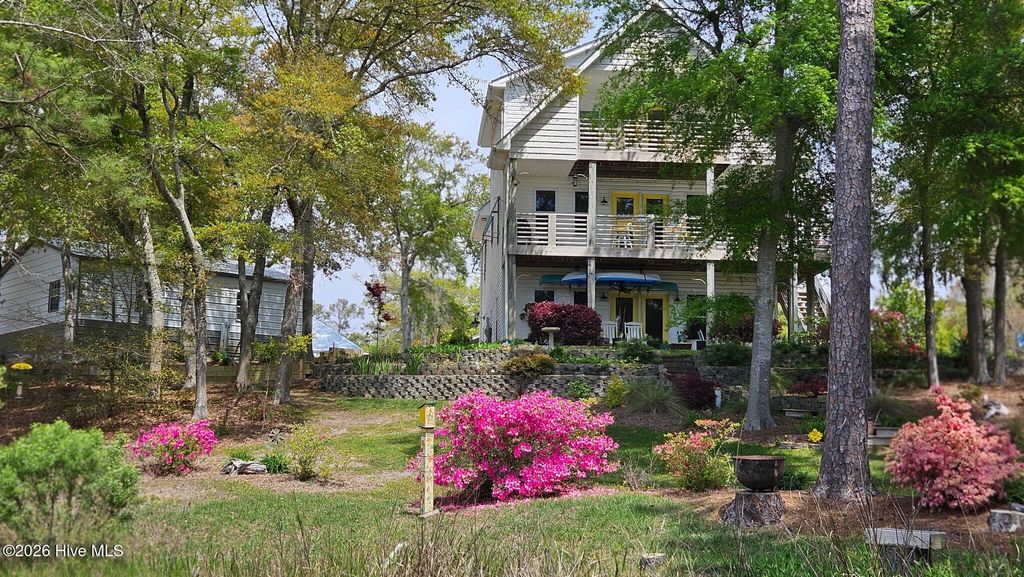 Photo of 103 SE 27th Street, Oak Island, NC 28465 (MLS # 100558416)
