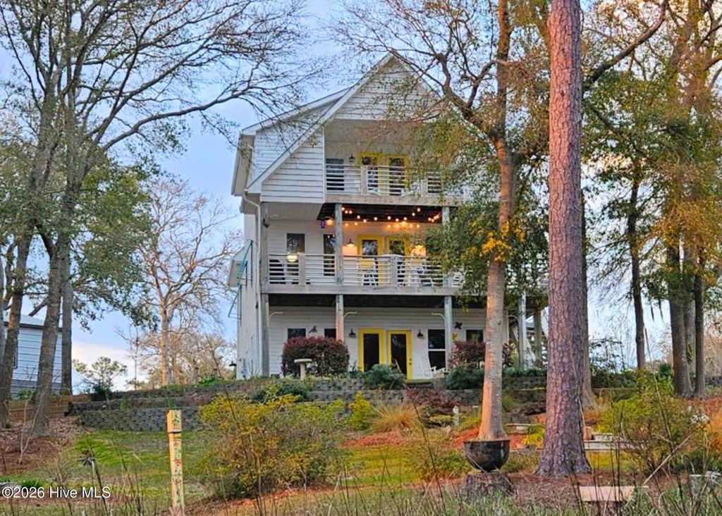 Photo of 103 SE 27th Street, Oak Island, NC 28465 (MLS # 100558416)