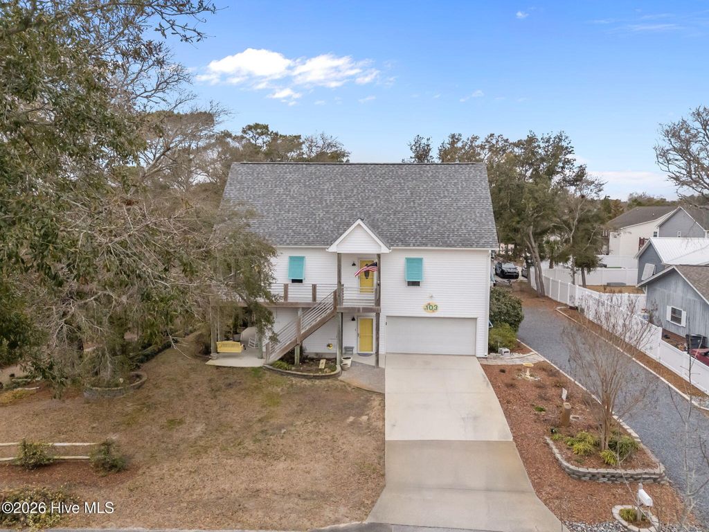 Photo of 103 SE 27th Street, Oak Island, NC 28465 (MLS # 100558416)