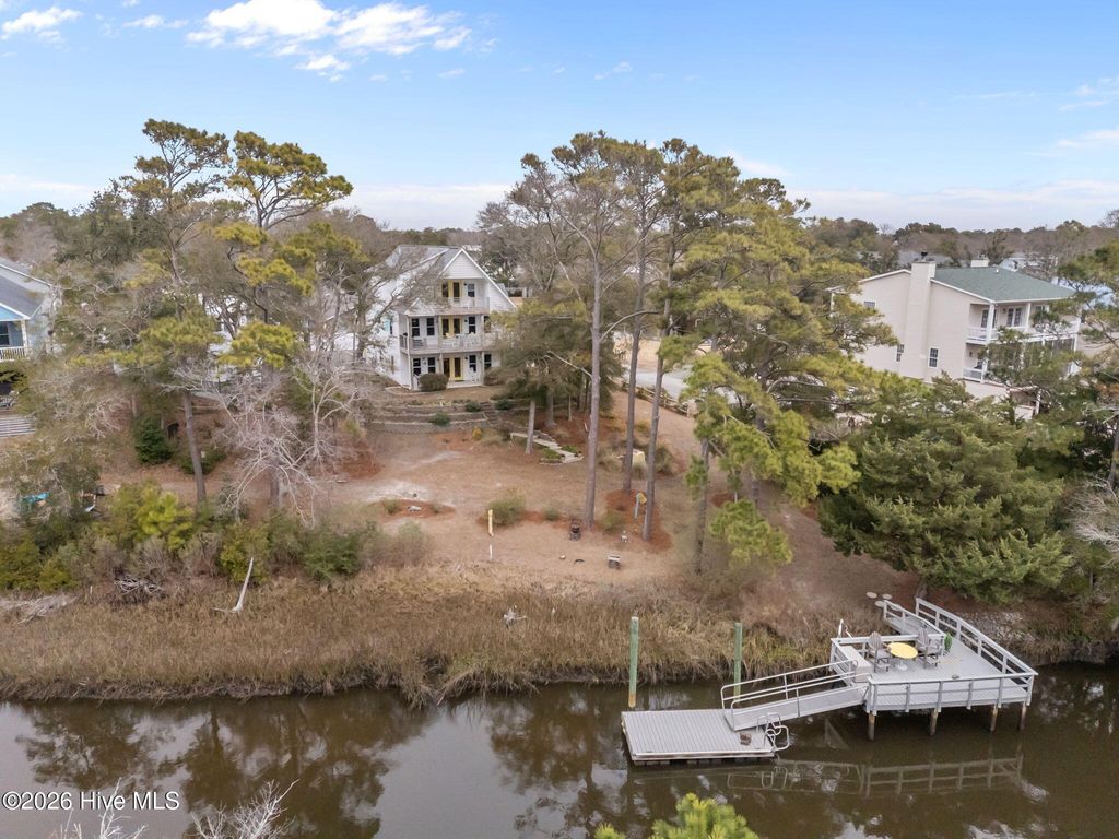 Photo of 103 SE 27th Street, Oak Island, NC 28465 (MLS # 100558416)