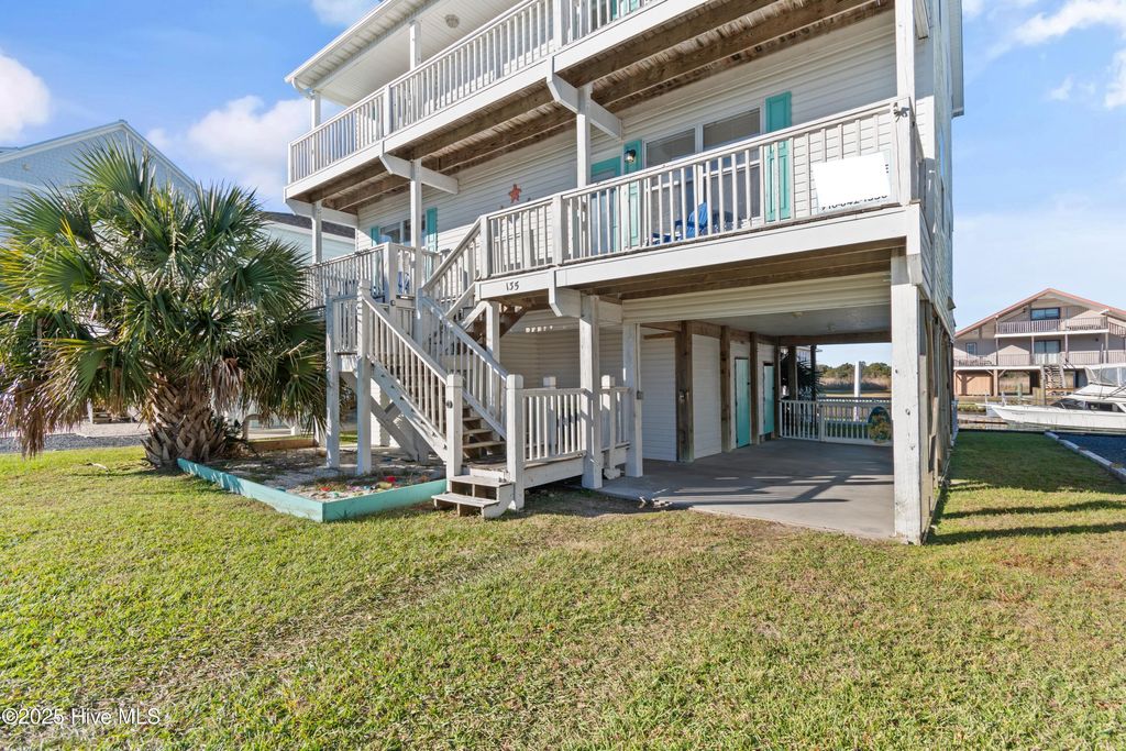 Photo of 135 Starfish Drive, Holden Beach, NC 28462 (MLS # 100542122)