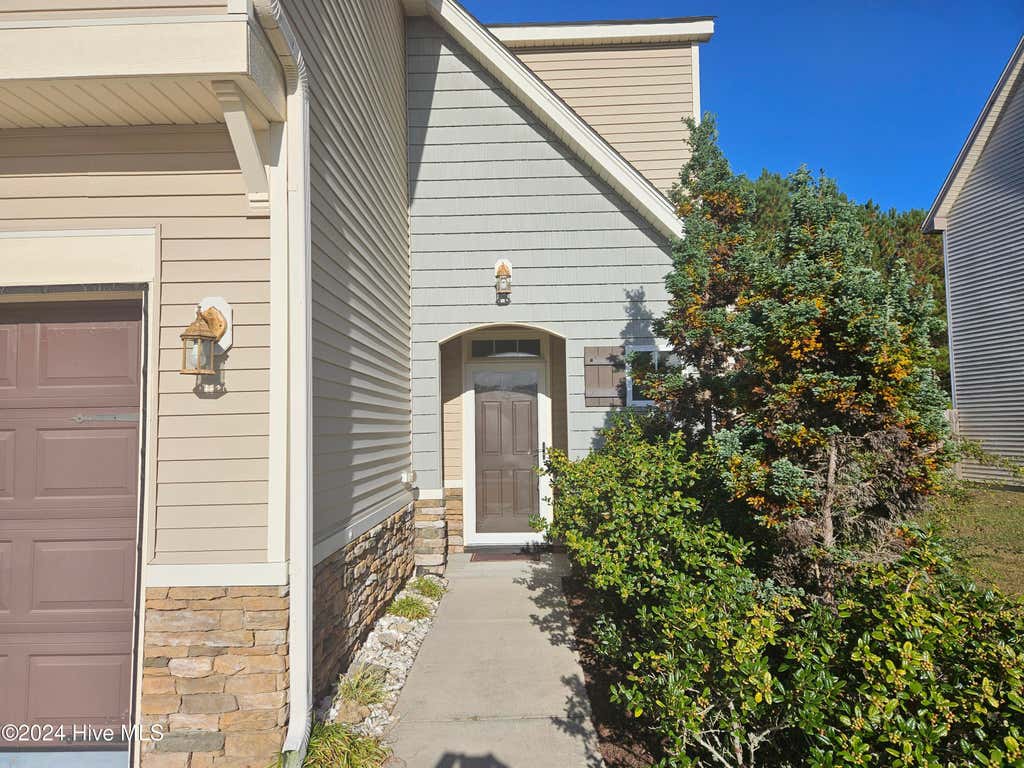 Photo of 210 Long Pond Drive, Sneads Ferry, NC 28460 (MLS # 100587547)