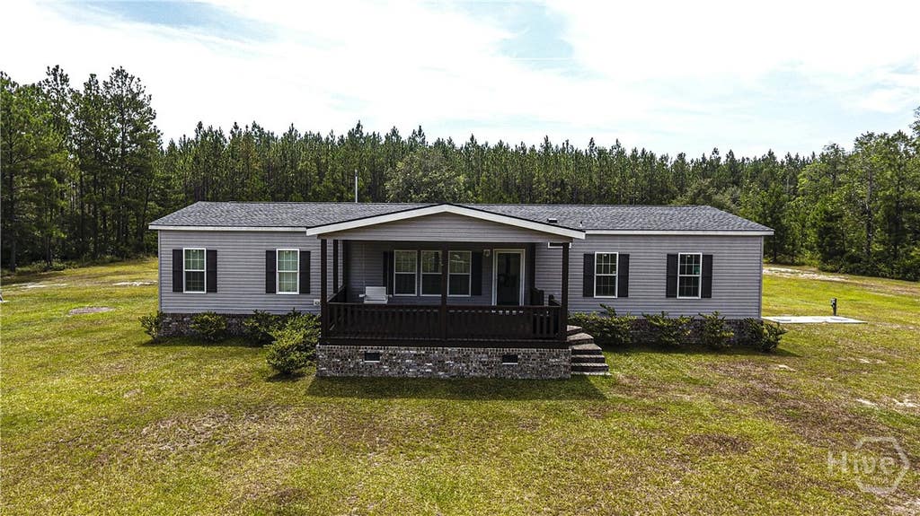 Photo of 1139 Henry Walcott Road NW, Ludowici, GA 31316 (MLS # SA361221)