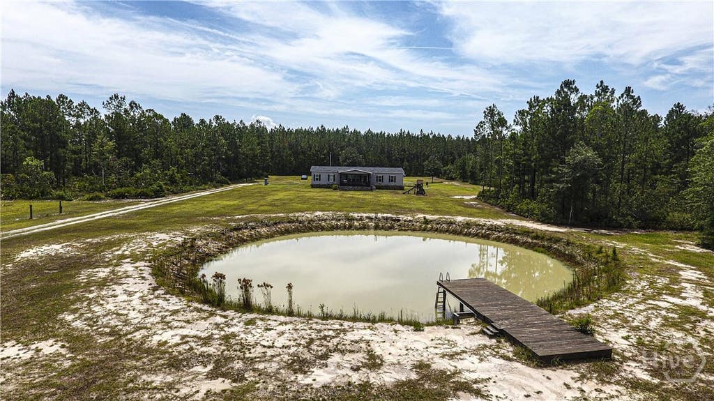 Photo of 1139 Henry Walcott Road NW, Ludowici, GA 31316 (MLS # SA361221)