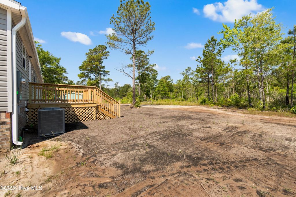 Photo of 6812 Lewis Drive SE, Winnabow, NC 28479 (MLS # 100575557)