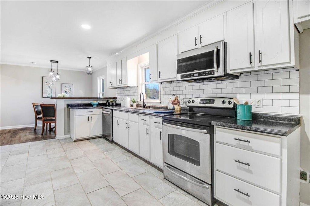 Photo of 1676 Tommys Road, Goldsboro, NC 27534 (MLS # 100601689)