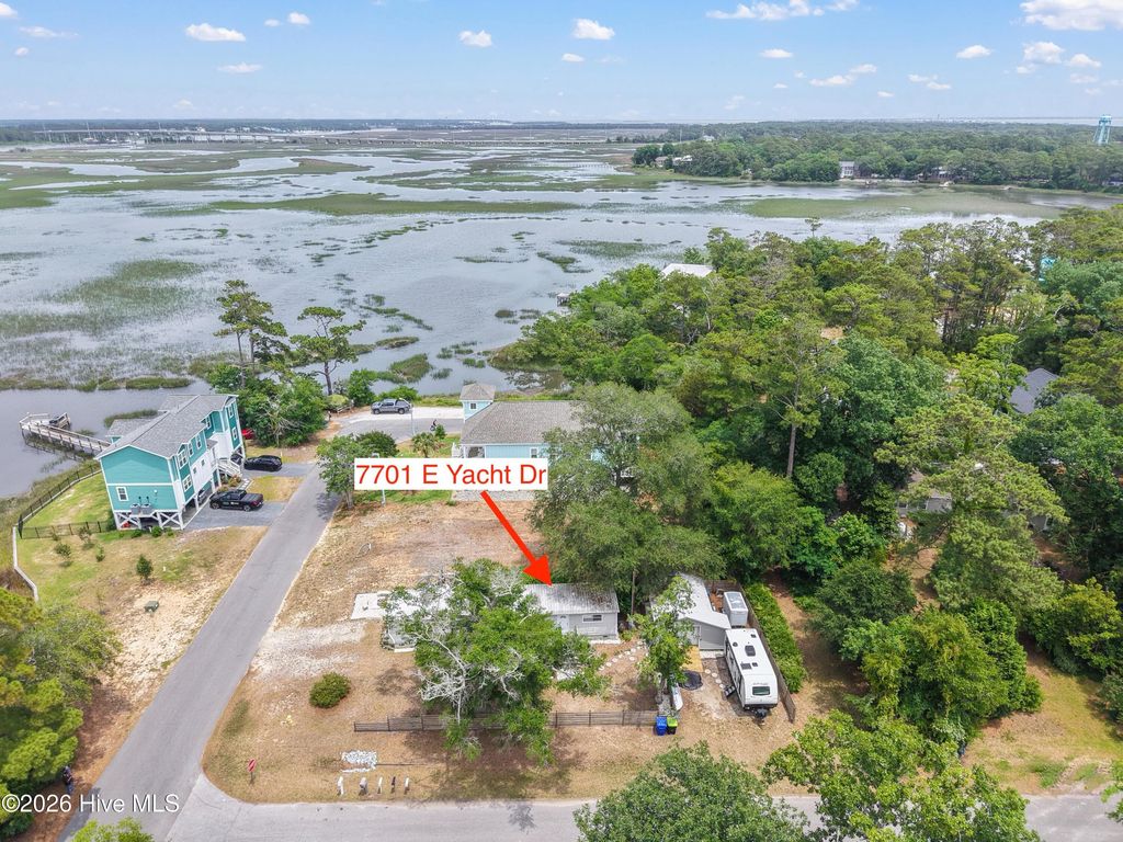 Photo of 7701 E Yacht Drive, Oak Island, NC 28465 (MLS # 100581003)