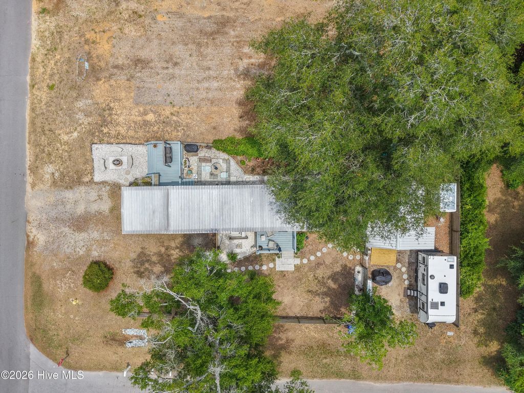 Photo of 7701 E Yacht Drive, Oak Island, NC 28465 (MLS # 100581003)