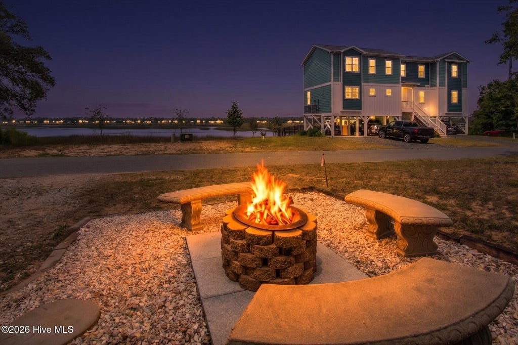 Photo of 7701 E Yacht Drive, Oak Island, NC 28465 (MLS # 100581003)