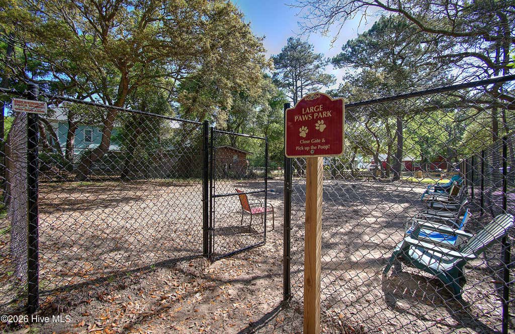 Photo of 7701 E Yacht Drive, Oak Island, NC 28465 (MLS # 100581003)