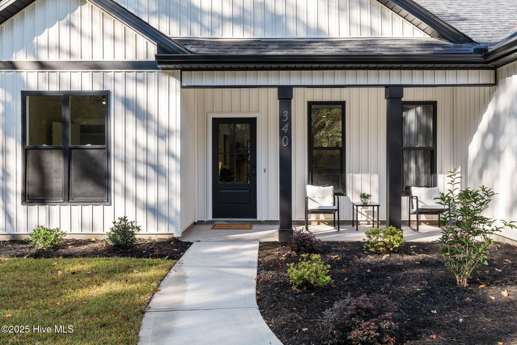 Photo of 340 Persimmon Road, Calabash, NC 28467 (MLS # 100537553)