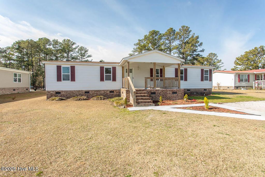 Photo of 423 Gray Drive SW, Shallotte, NC 28470 (MLS # 100549919)