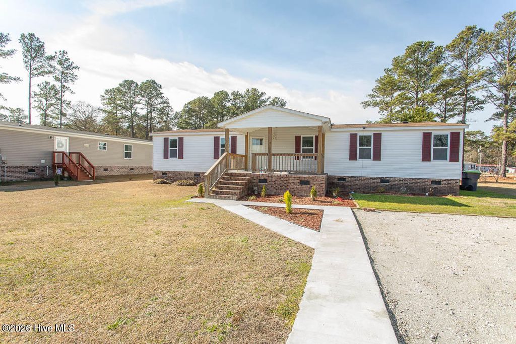 Photo of 423 Gray Drive SW, Shallotte, NC 28470 (MLS # 100549919)