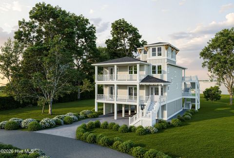 Photo of 411 New River Inlet Road, North Topsail Beach, NC 28460 (MLS # 100571368)