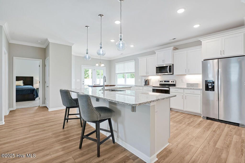 Photo of 919 Billys Dream Circle SW, Supply, NC 28462 (MLS # 100563599)