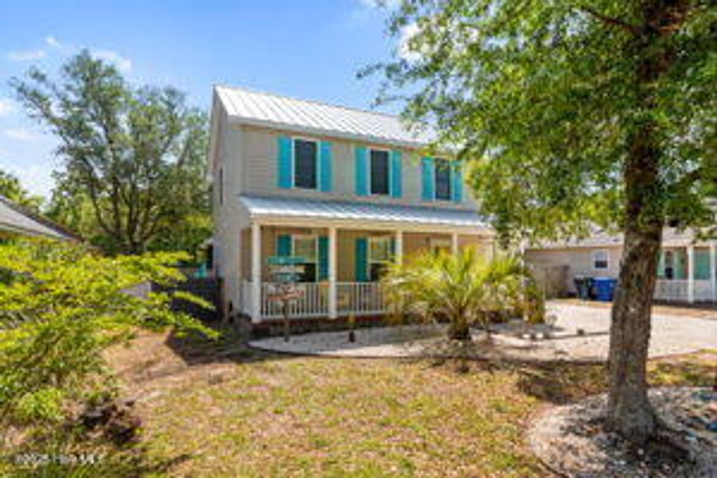 Photo of 124 NE 15th Street, Oak Island, NC 28465 (MLS # 100505166)