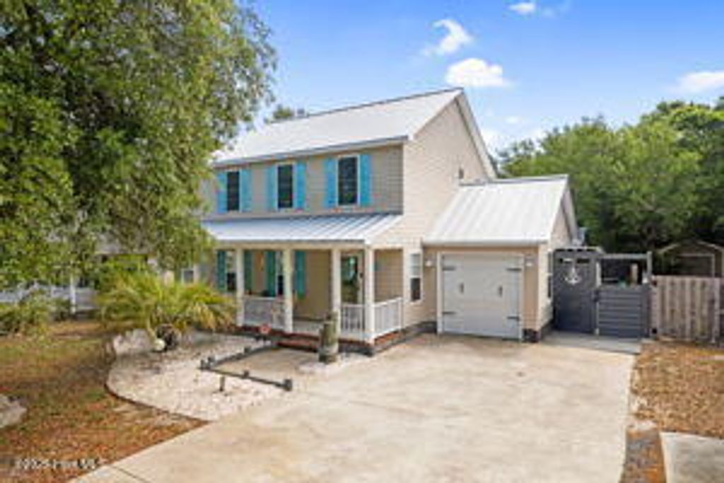 Photo of 124 NE 15th Street, Oak Island, NC 28465 (MLS # 100505166)