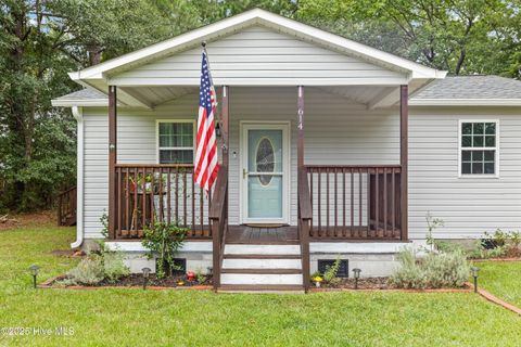 Photo of 614 Saint Johns Church Road, Hampstead, NC 28443 (MLS # 100548487)
