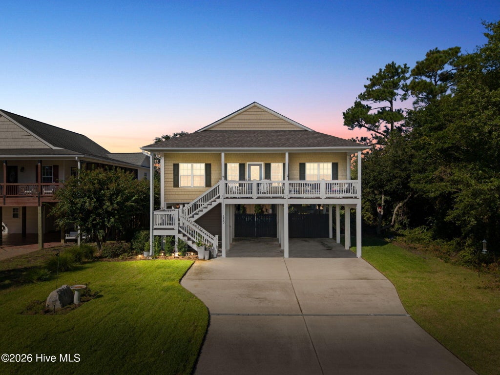 Photo of 115 NW 9th Street, Oak Island, NC 28465 (MLS # 100610956)
