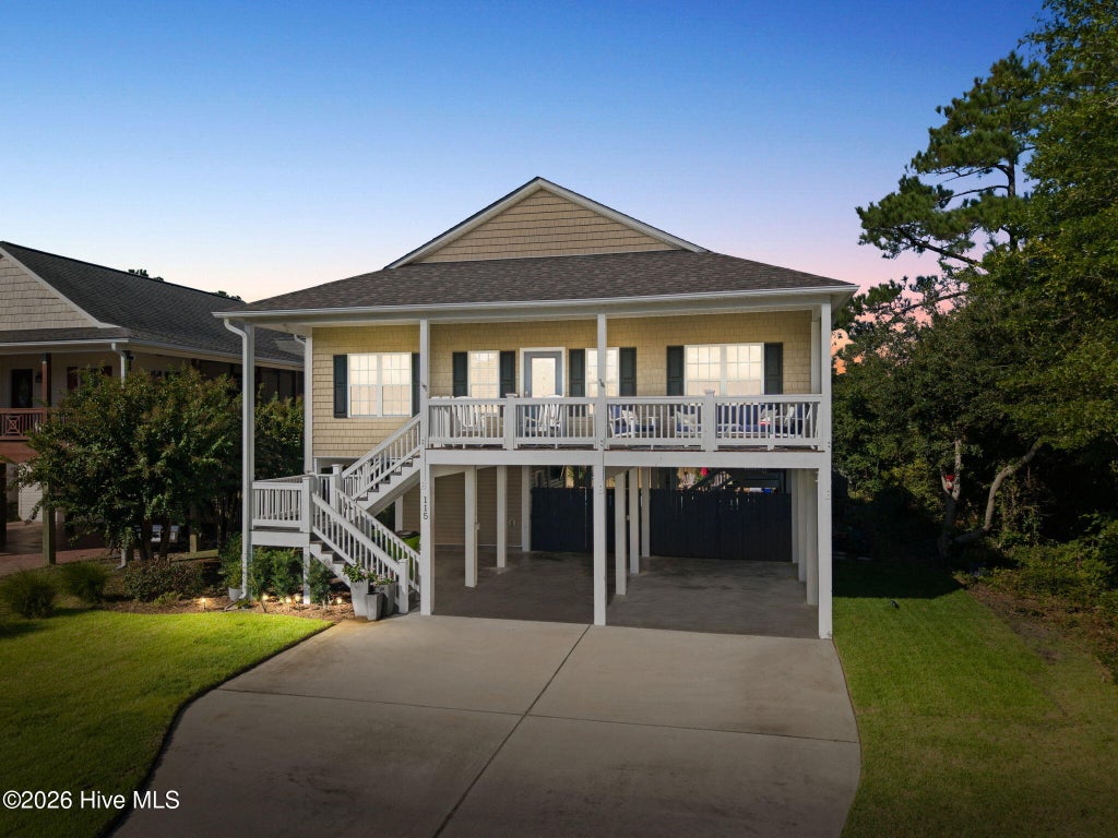 Photo of 115 NW 9th Street, Oak Island, NC 28465 (MLS # 100610956)