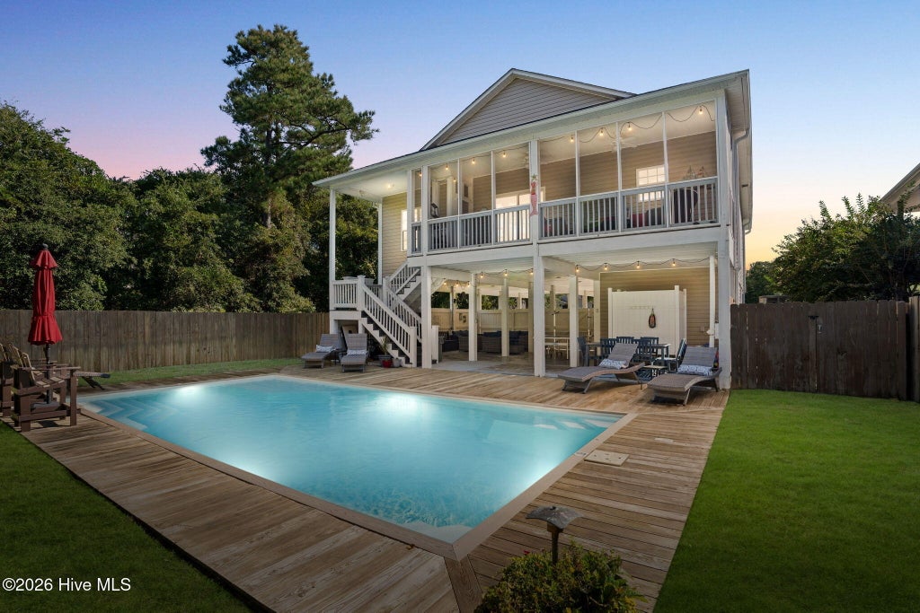 Photo of 115 NW 9th Street, Oak Island, NC 28465 (MLS # 100610956)