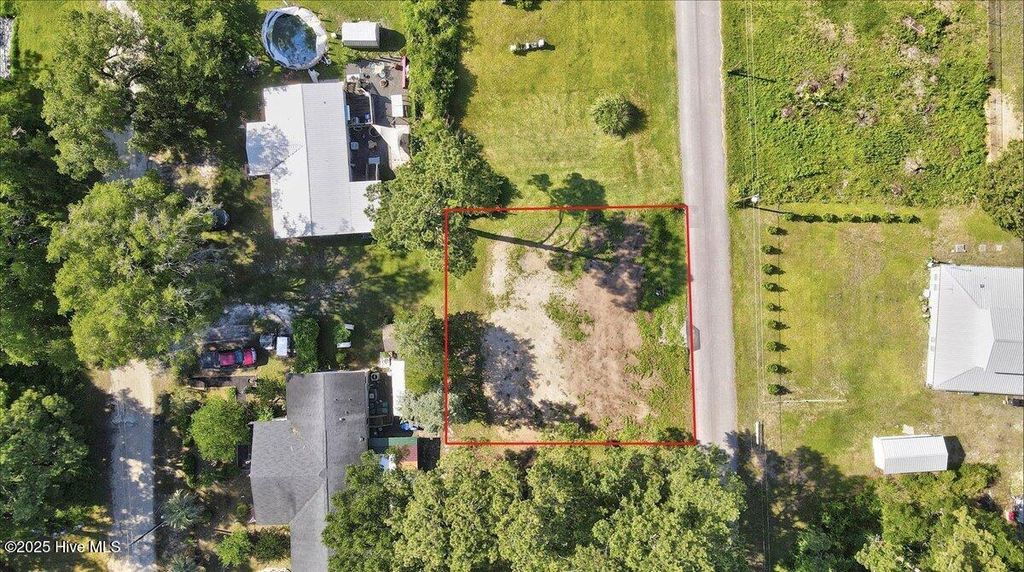 Photo of 1851 Inland Drive SW, Ocean Isle Beach, NC 28469 (MLS # 100568566)