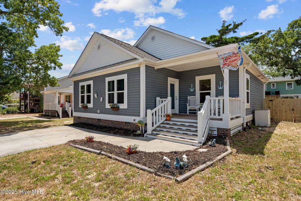 Photo of 129 NE 1st Street, Oak Island, NC 28465 (MLS # 100516746)