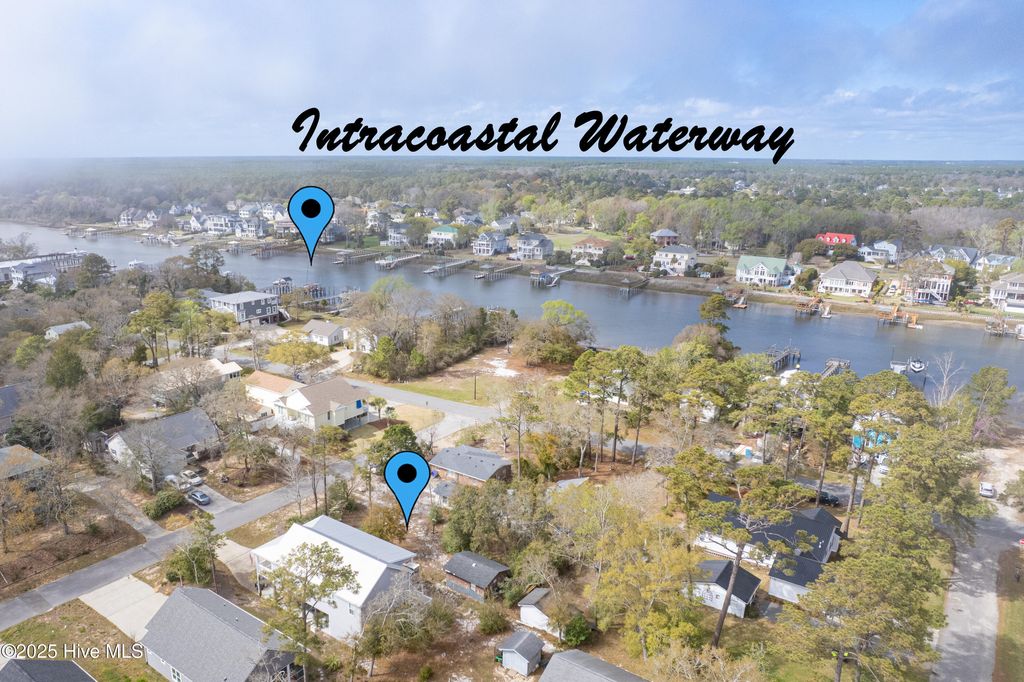 Photo of 130 NE 26th Street, Oak Island, NC 28465 (MLS # 100550282)