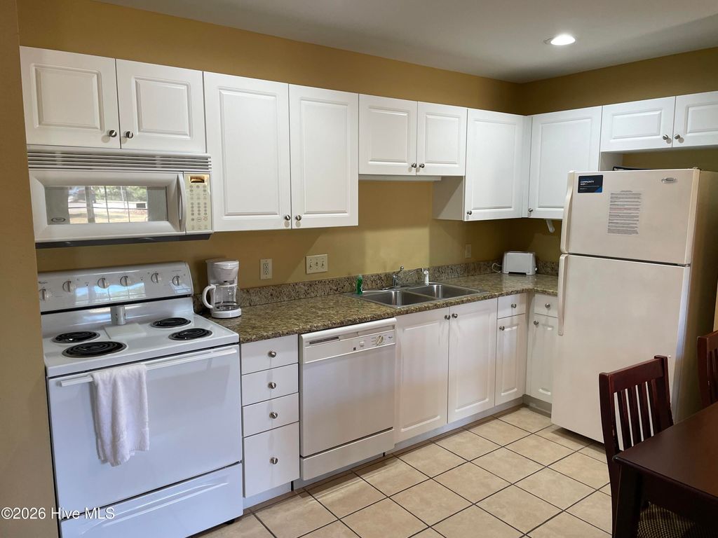 Photo of 490 Little River Farm Boulevard #A104, Carthage, NC 28327 (MLS # 100569088)