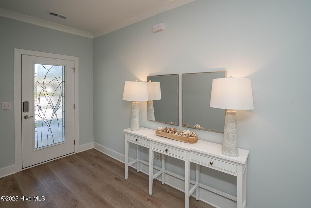 Photo of 137 NE 3rd Street, Oak Island, NC 28465 (MLS # 100531648)