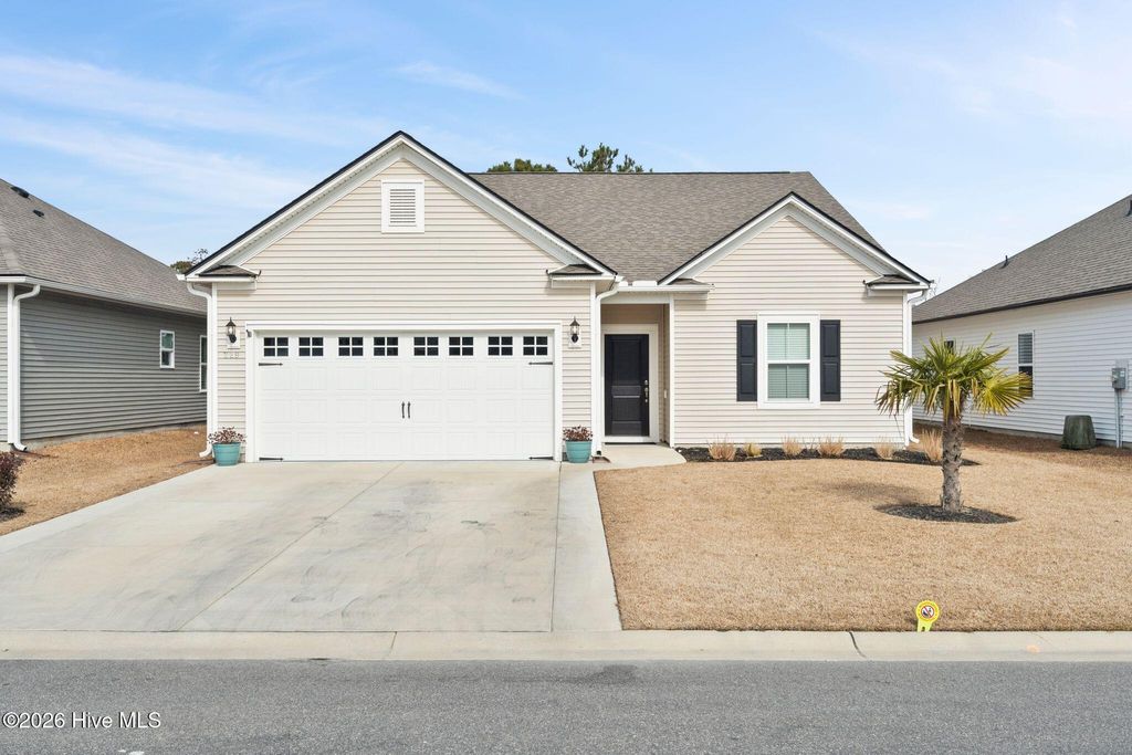 Photo of 229 Eagle Claw Drive, Carolina Shores, NC 28467 (MLS # 100553867)
