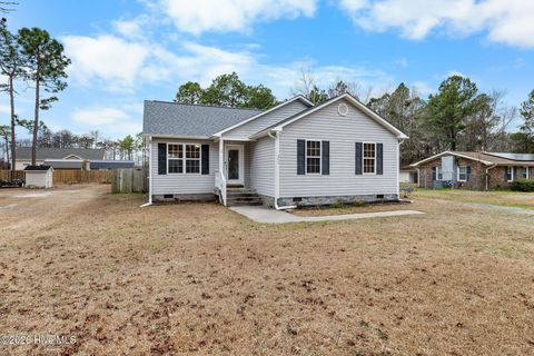 Photo of 371 Pine Lake Road, Southport, NC 28461 (MLS # 100551097)