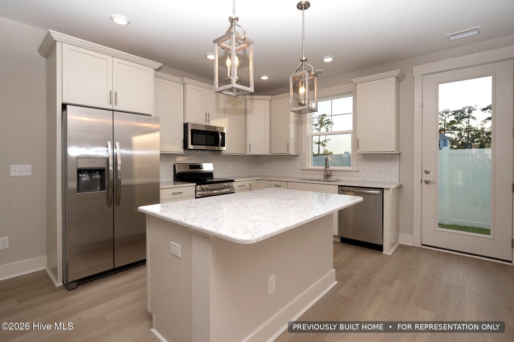 Photo of 1941 Indigo Cove Way, Calabash, NC 28467 (MLS # 100607482)