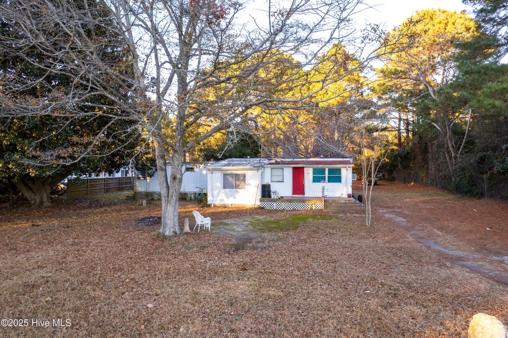 Photo of 128 Snow Goose Lane, Knotts Island, NC 27950 (MLS # 100545547)