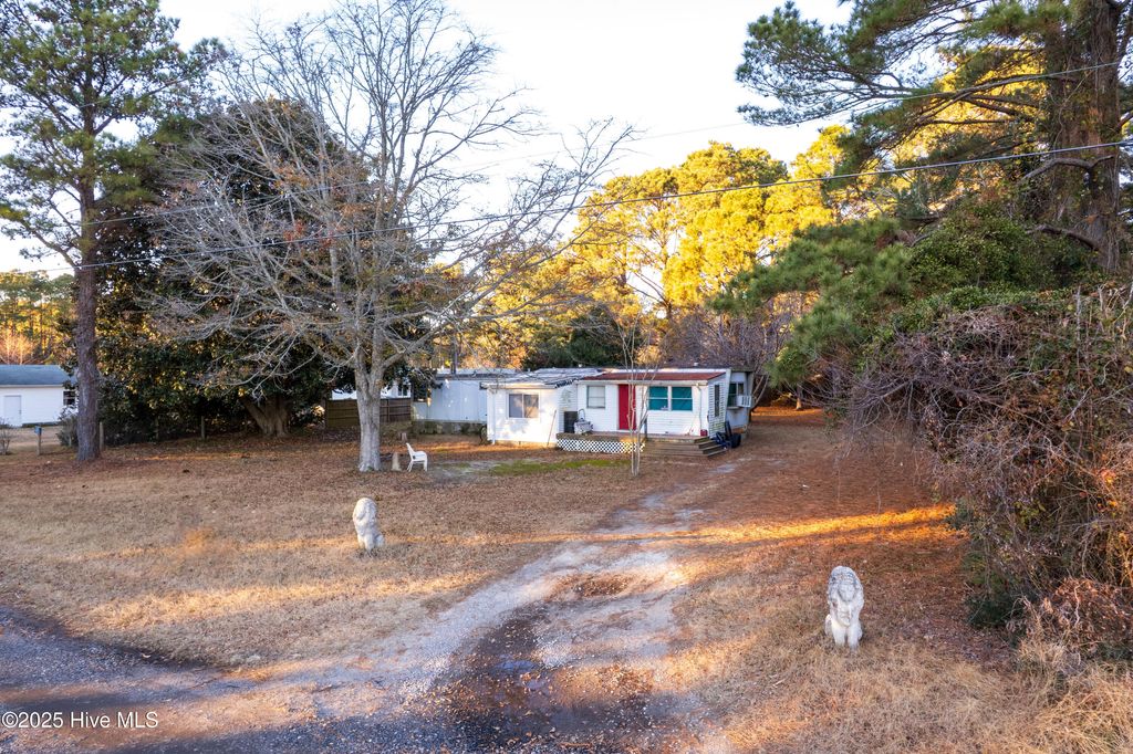 Photo of 128 Snow Goose Lane, Knotts Island, NC 27950 (MLS # 100545547)