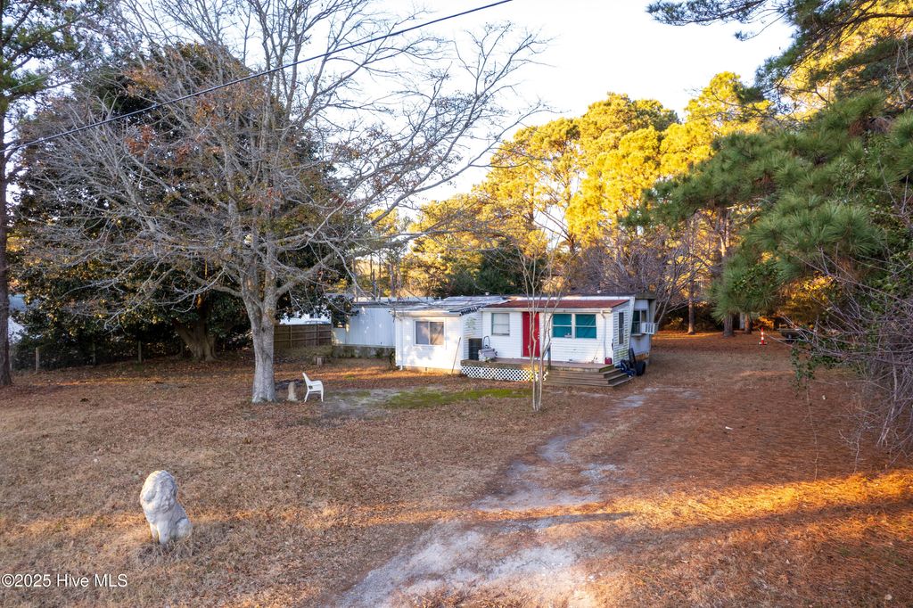 Photo of 128 Snow Goose Lane, Knotts Island, NC 27950 (MLS # 100545547)