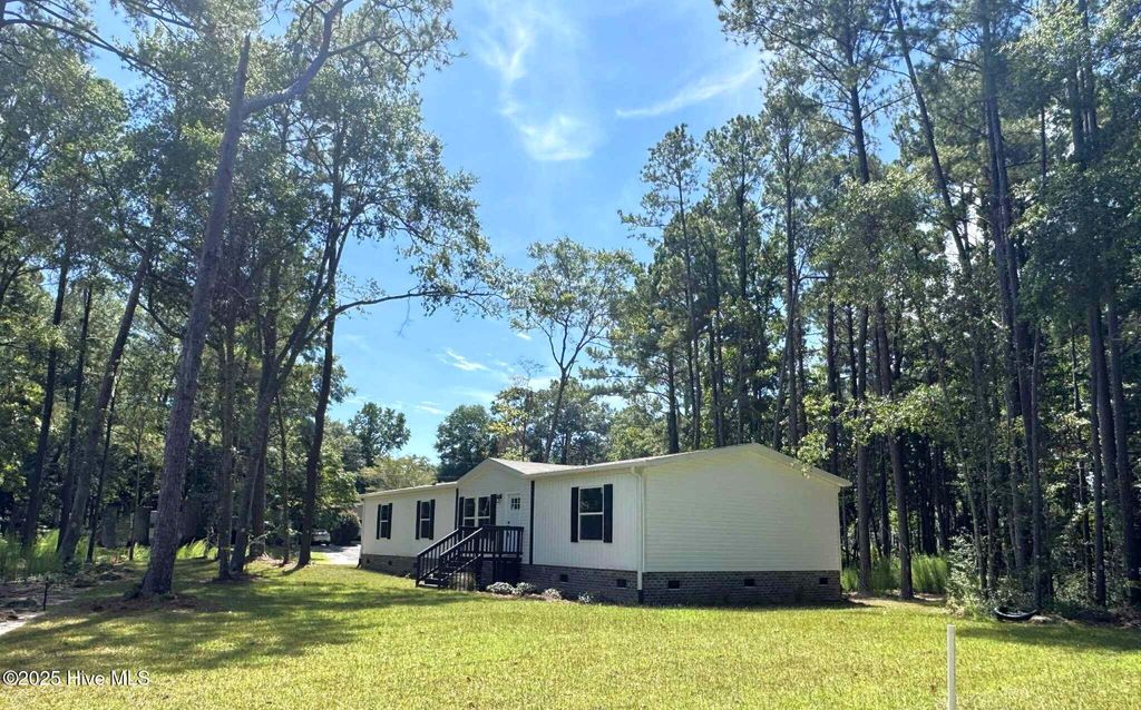 Photo of 9280 Heritage Drive SW, Calabash, NC 28467 (MLS # 100547608)