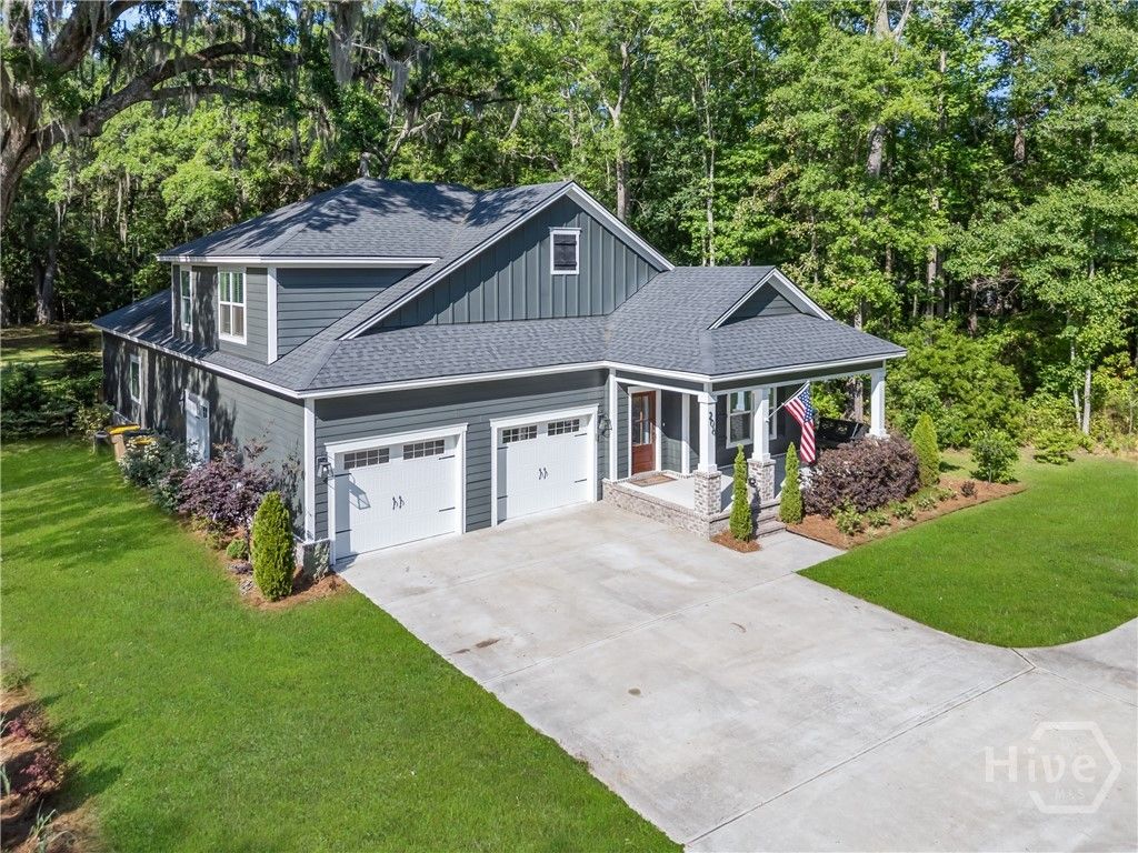 Photo of 206 Windsong Drive, Richmond Hill, GA 31324 (MLS # SA353040)