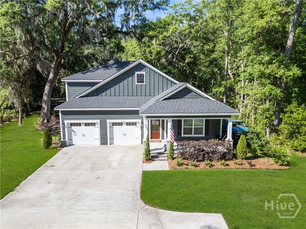 Photo of 206 Windsong Drive, Richmond Hill, GA 31324 (MLS # SA353040)