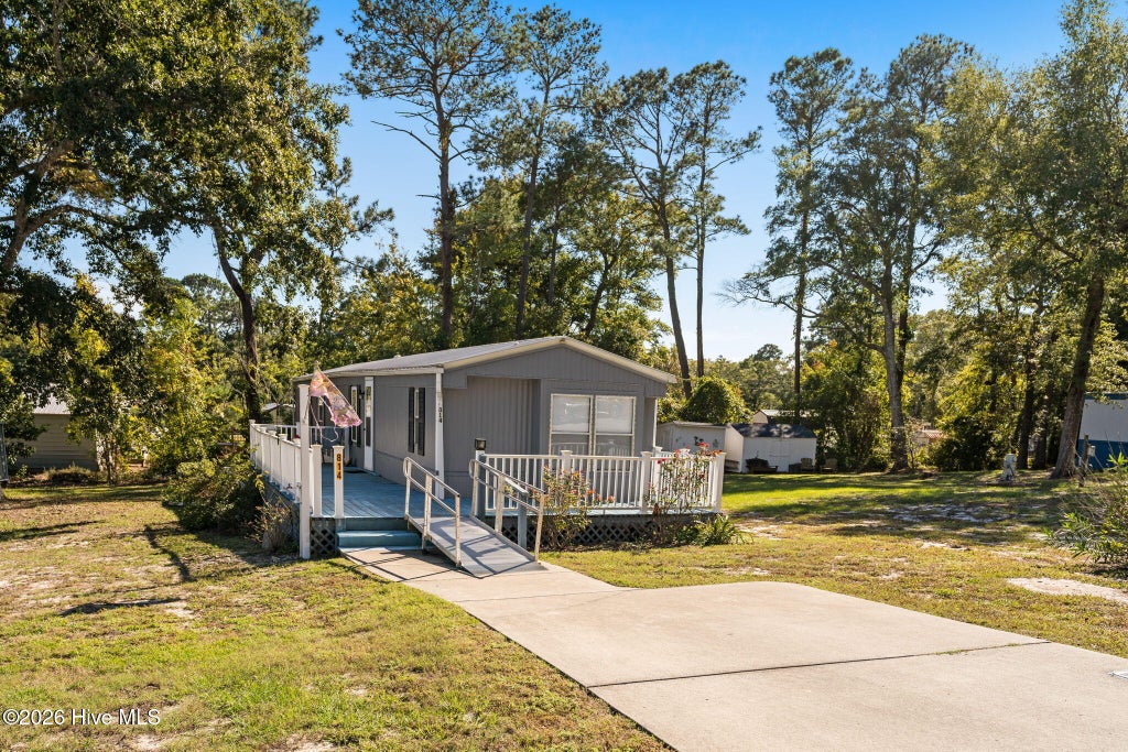 Photo of 814 Dogwood Drive, Sunset Beach, NC 28468 (MLS # 100613348)