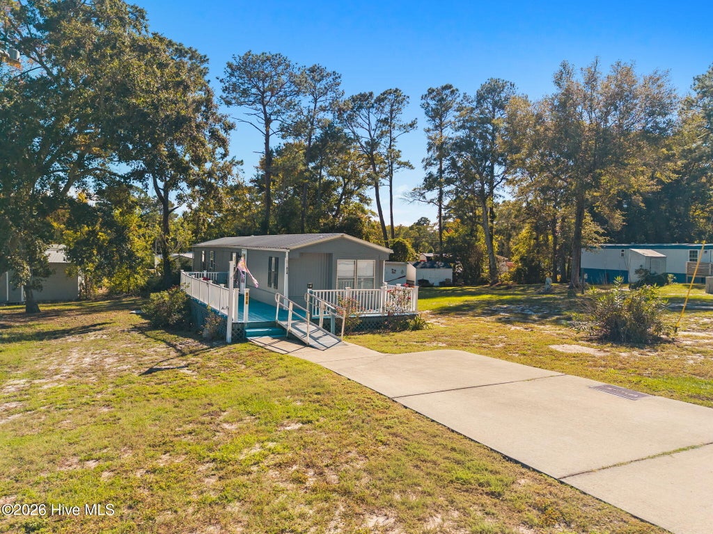 Photo of 814 Dogwood Drive, Sunset Beach, NC 28468 (MLS # 100613348)