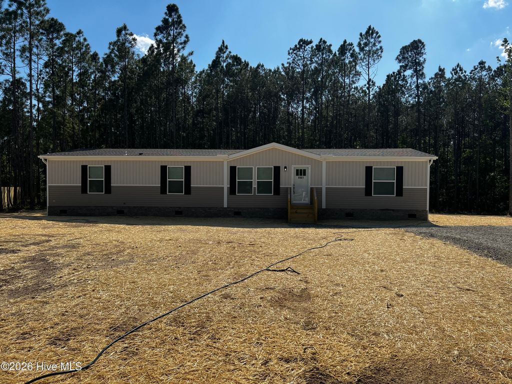 Photo of 8861 Millers Path NE, Leland, NC 28451 (MLS # 100570428)