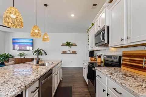 Tiny photo for 310 Edgewater Way, Surf City, NC 28445 (MLS # 100545579)