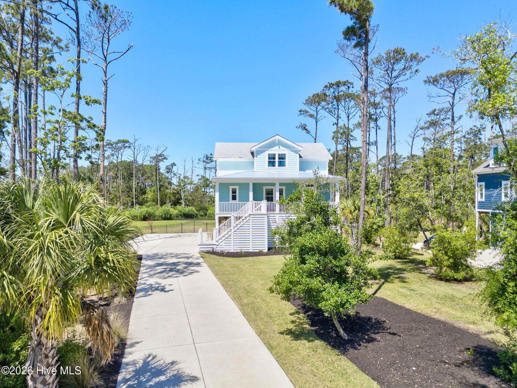 Photo of 614 Marsh Grass Court, Southport, NC 28461 (MLS # 100574595)