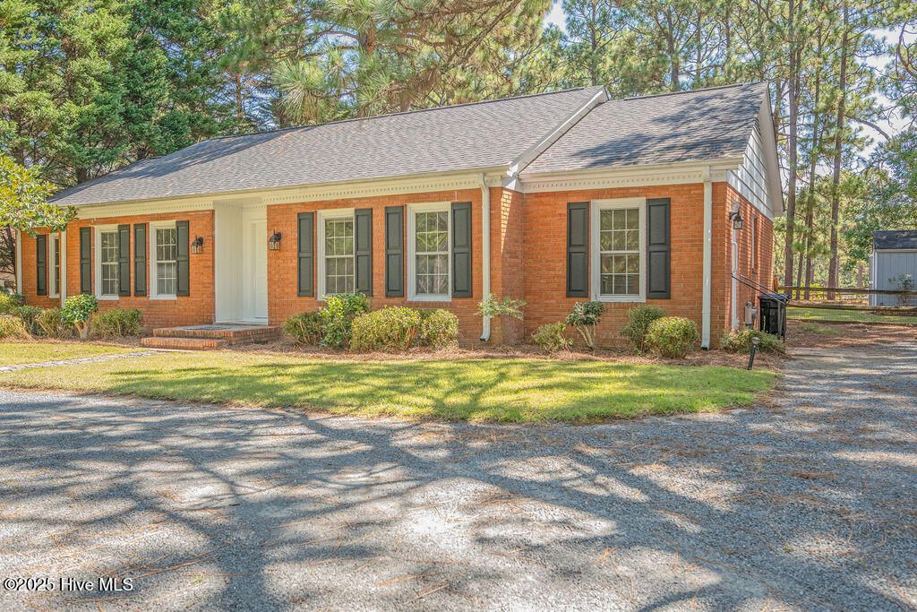 Photo of 19 Windsong Place, Whispering Pines, NC 28327 (MLS # 100559244)