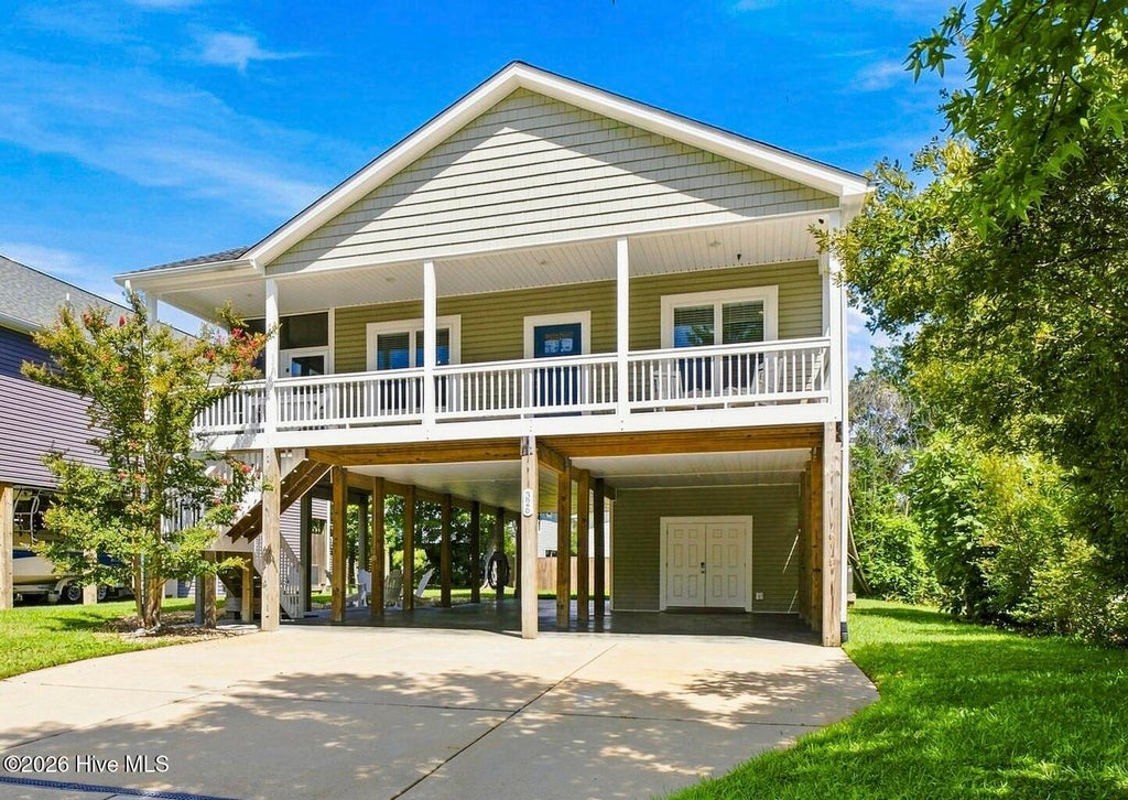 Photo of 326 NE 56th Street, Oak Island, NC 28465 (MLS # 100595878)